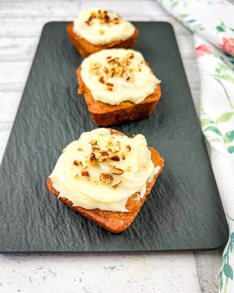 3 Mini Hummingbird Cakes on a black platter.