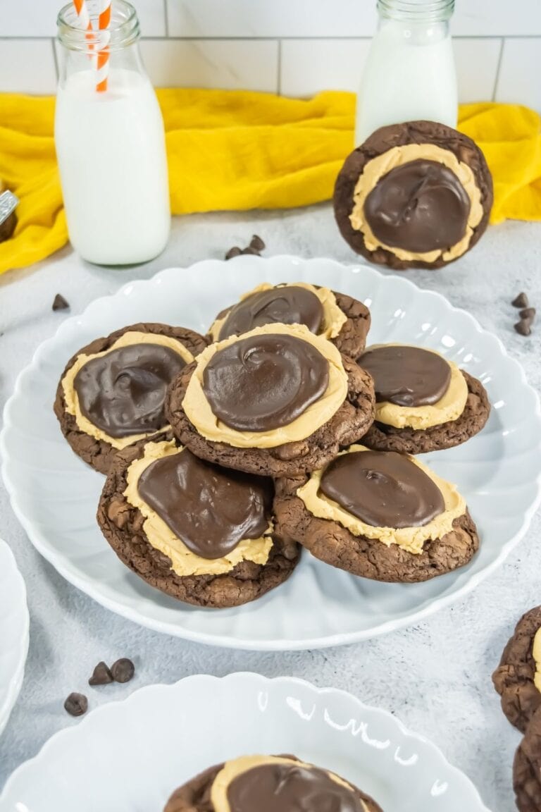 Chocolate peanut butter cookies on a cooling rack.