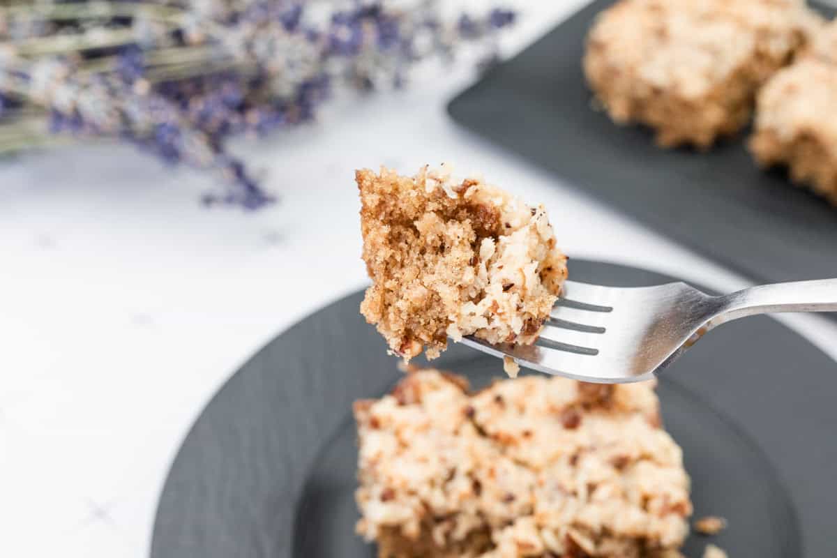Old Fashioned Oatmeal Cake with gooey coconut-pecan topping and golden broiled layer.