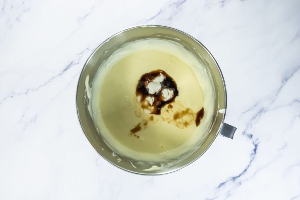 Add the sour cream and vanilla, mixing until well combined.
