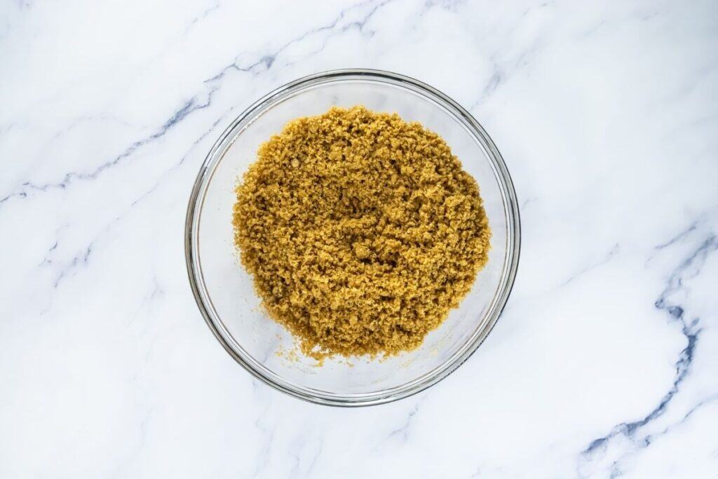 Mix until the texture resembles wet sand.