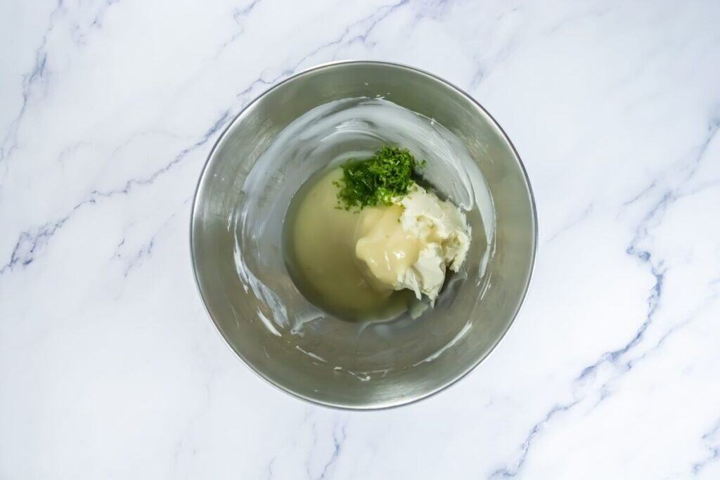 Cream cheese with sweetened condensed milk and key lime juice and zest.