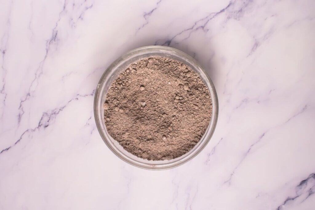Mixture of crushed Oreos, flour, cornstarch, cocoa powder, baking soda, baking powder, cream of tartar, and salt.