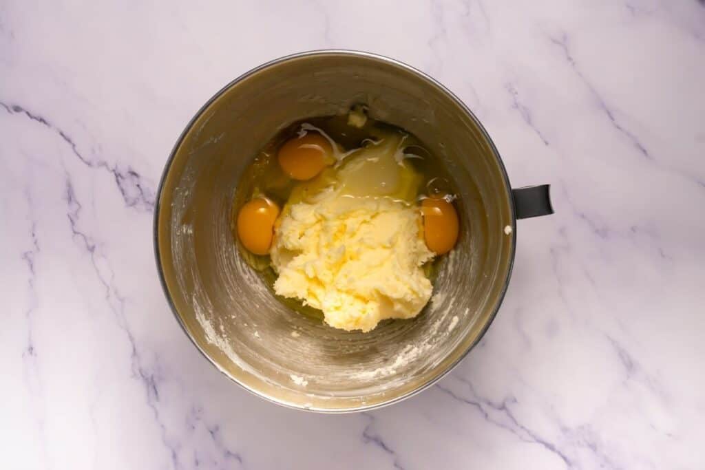 Softened butter and sugar have been creamed together, then eggs were added.