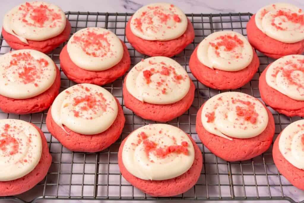 Crumbl Copycat Pink Velvet Cookies with sprinkle on top.