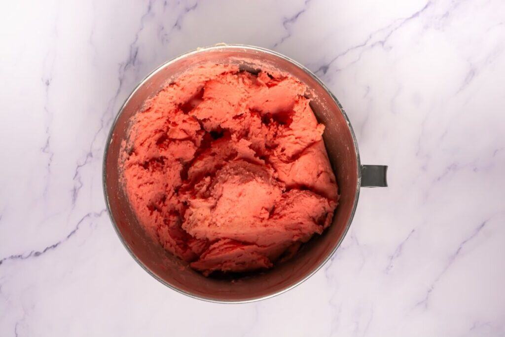 Pink food coloring added.