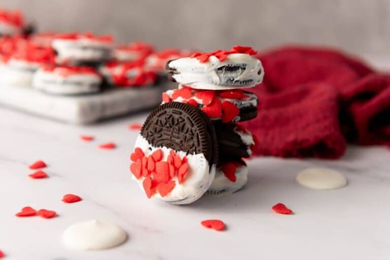Valentine's day Oreos with heart-shaped sprinkles.