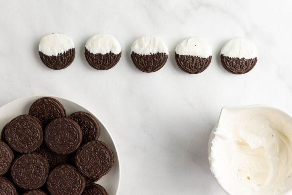 Oreo cookies dipped on a white candy melt.