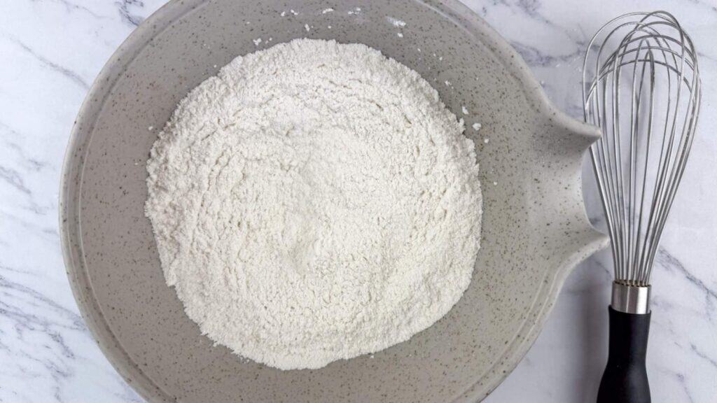 Whisk together the flour, baking powder, salt, and cinnamon.